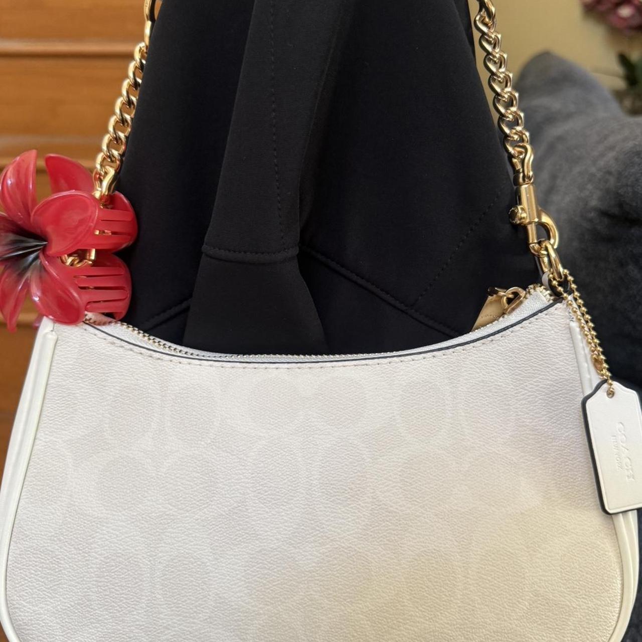 Teri white coach shoulder bag with gold hardware