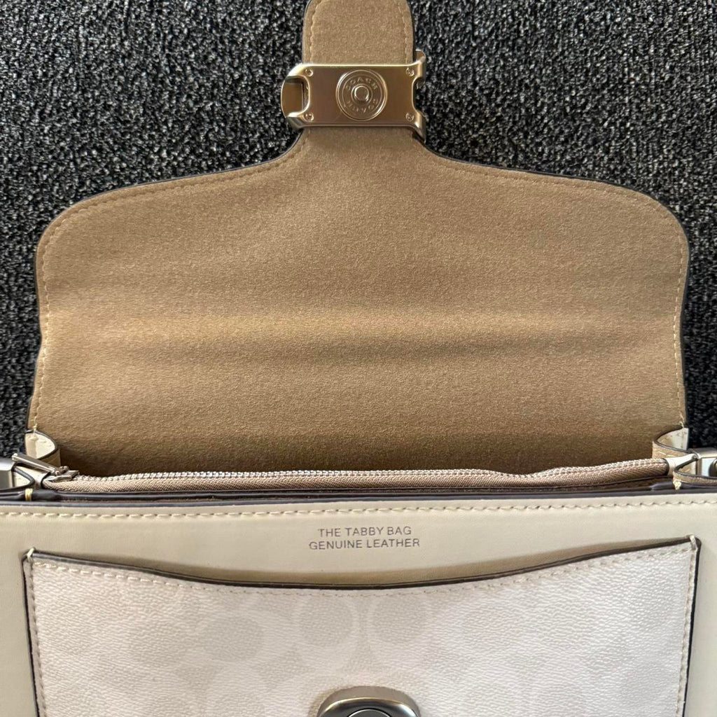 Tabby shoulder bag with signature canvas