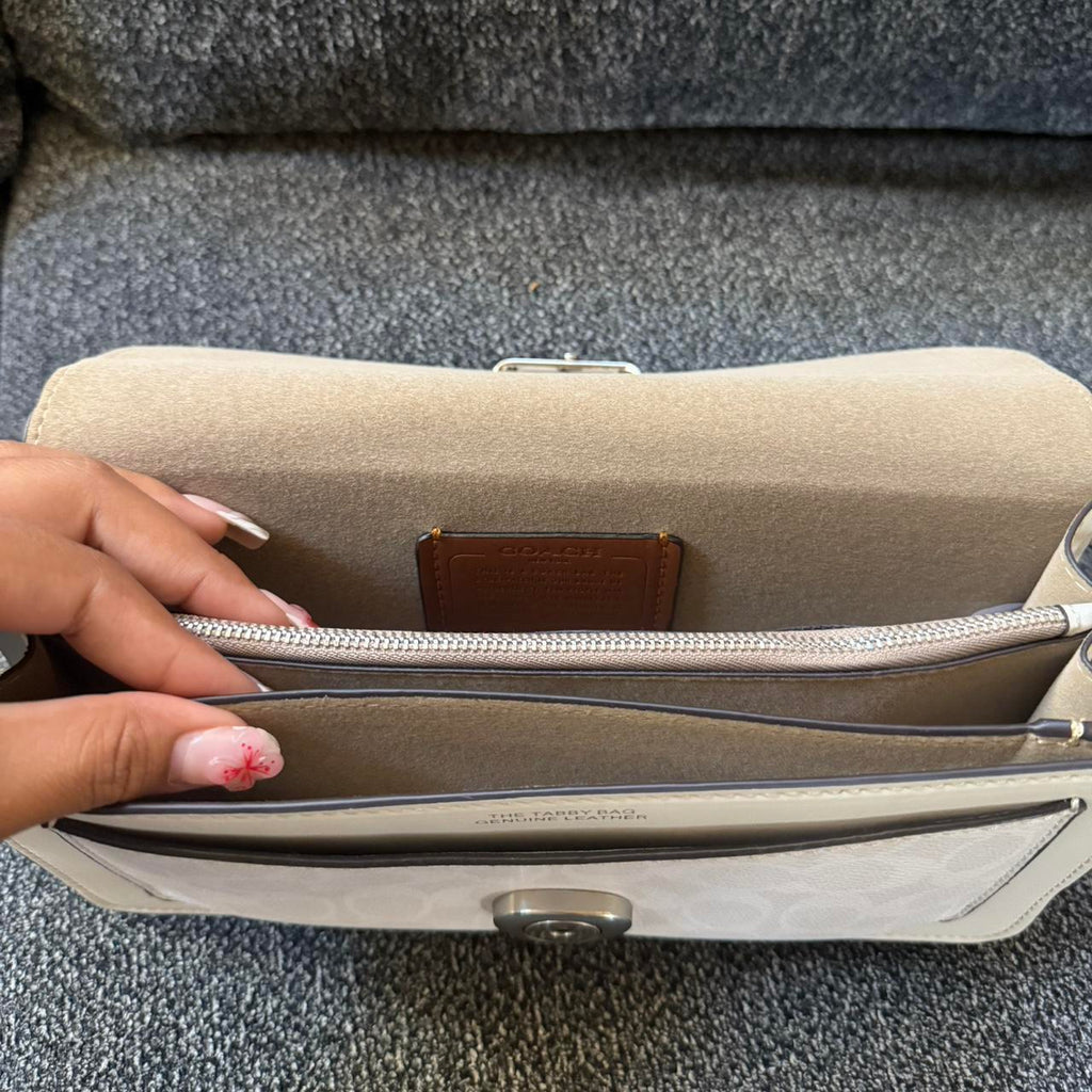 Tabby shoulder bag with signature canvas