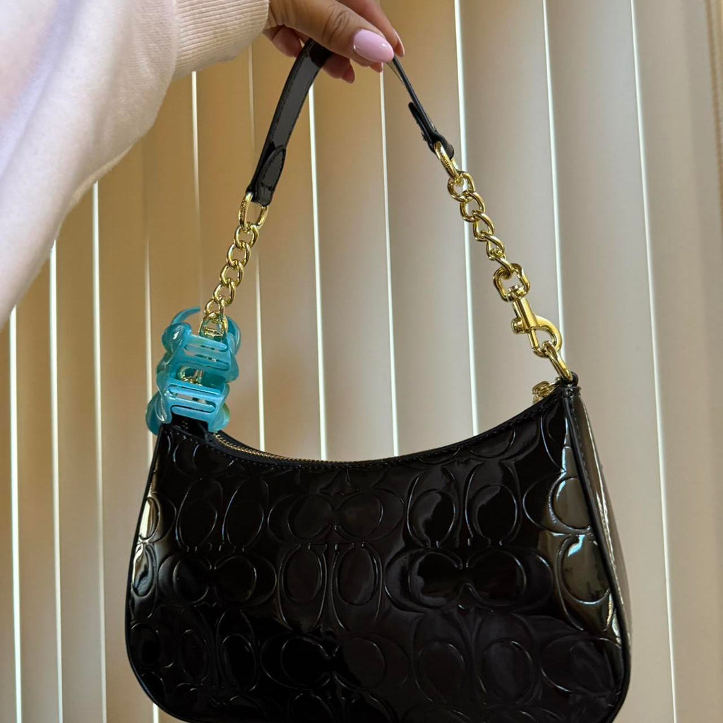 Black Coach shoulder bag with goldchain