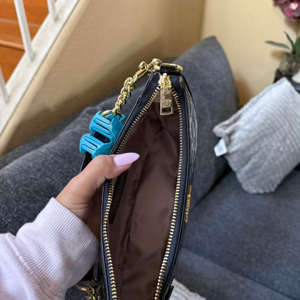 Black Coach shoulder bag with goldchain