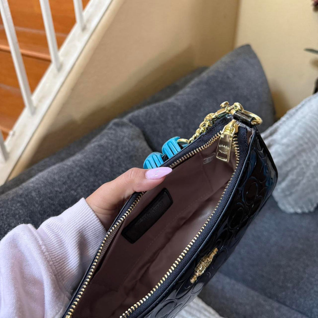 Black Coach shoulder bag with goldchain