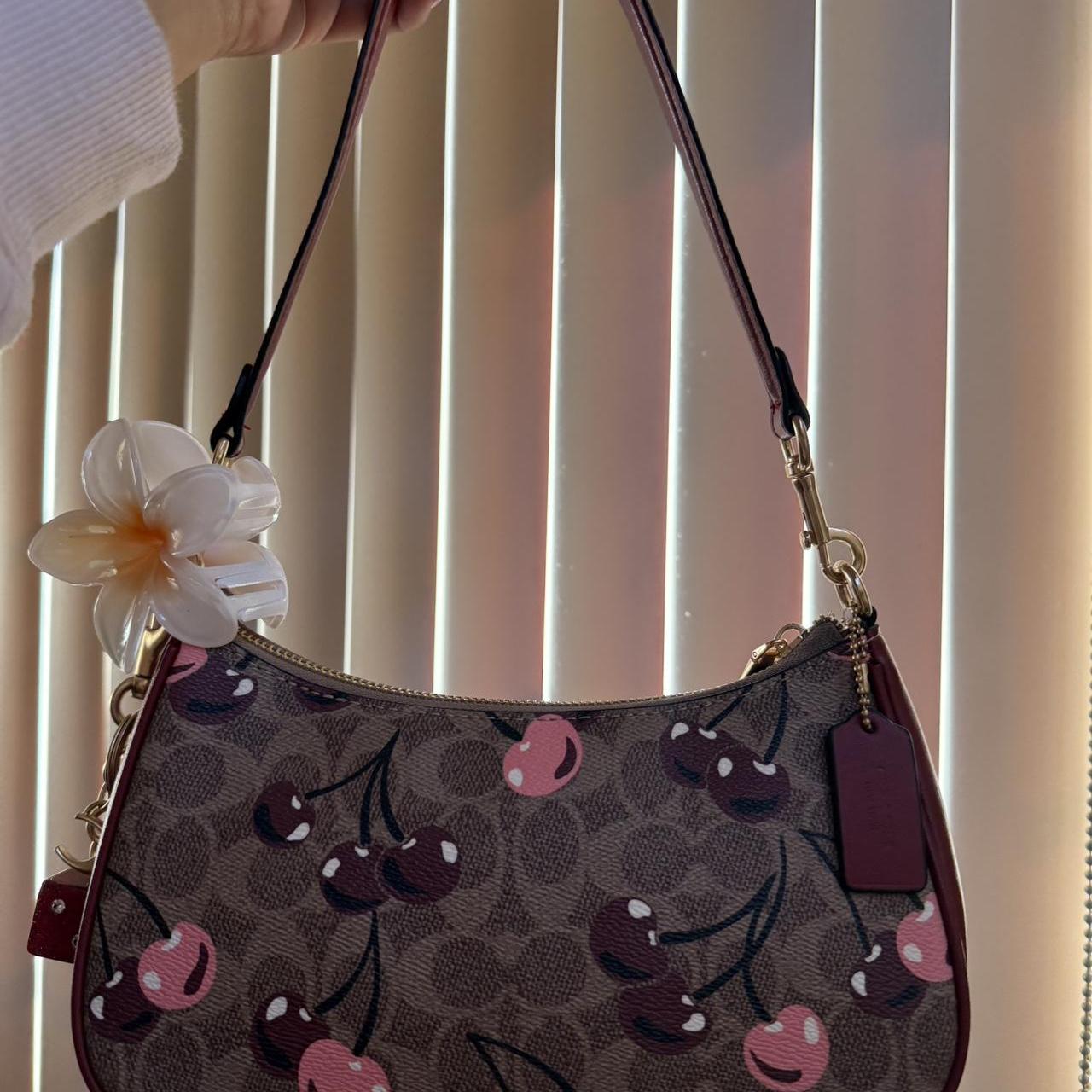 Teri shoulder bag in signature canvas with cherry print