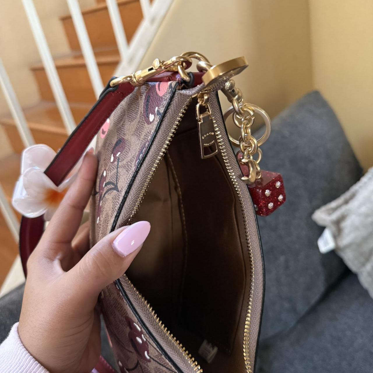 Teri shoulder bag in signature canvas with cherry print