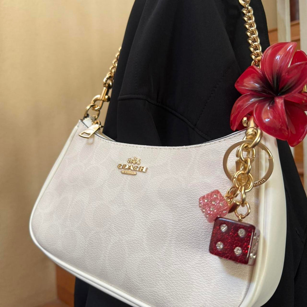 Teri white coach shoulder bag with gold hardware