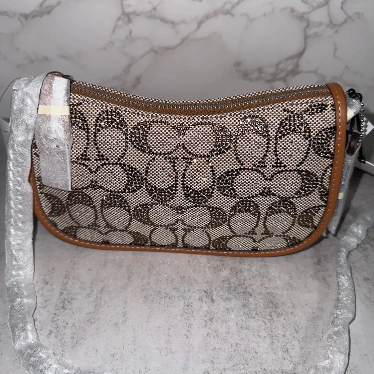 Coach crystal swinger bag